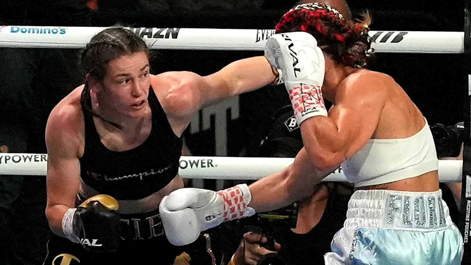 Boxers exchanging punches in the ring Boxers exchanging punches in the ring