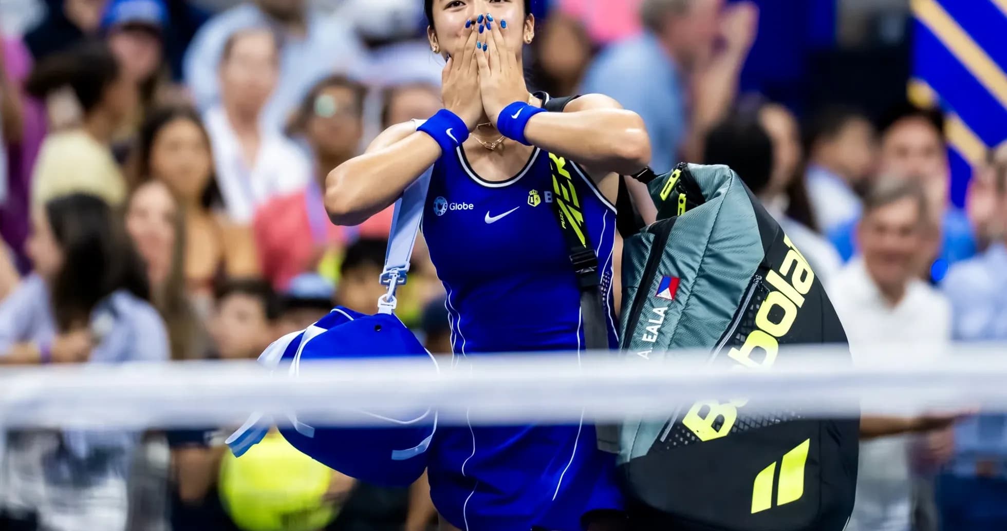 Tennis player celebrating after match victory Tennis player celebrating after match victory