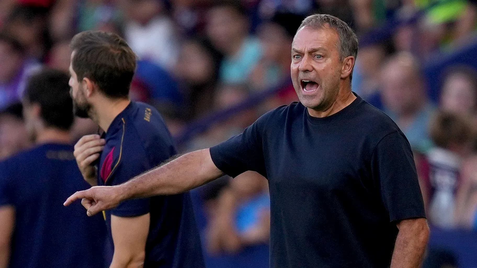 Coach shouting instructions during a match Coach shouting instructions during a match