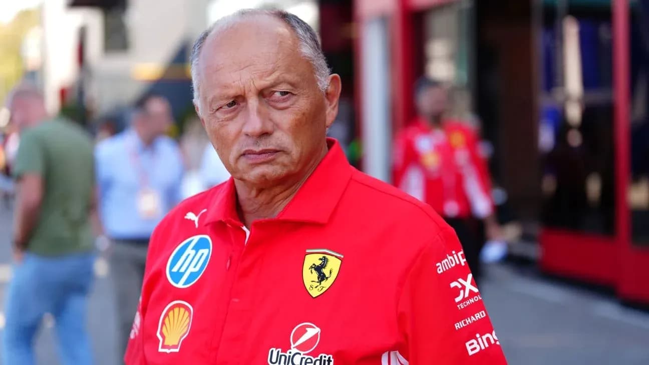 Team member in Ferrari attire at the paddock Team member in Ferrari attire at the paddock