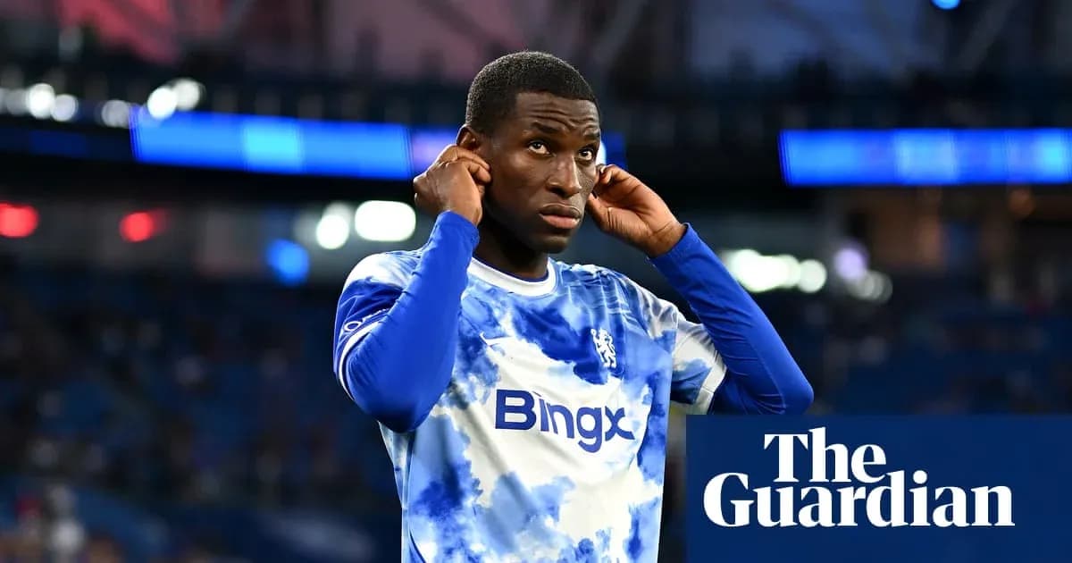 Player adjusting his earphones before the match Player adjusting his earphones before the match