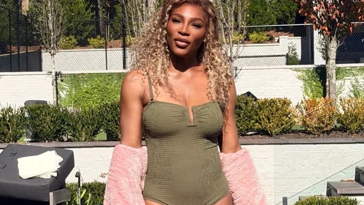 Person in swimsuit posing outdoors with greenery Person in swimsuit posing outdoors with greenery