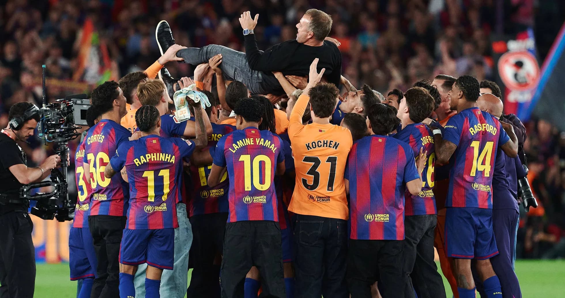 Barcelona team celebrating around their coach Barcelona team celebrating around their coach