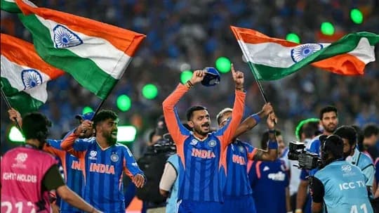 Indian players celebrating with flags after victory Indian players celebrating with flags after victory