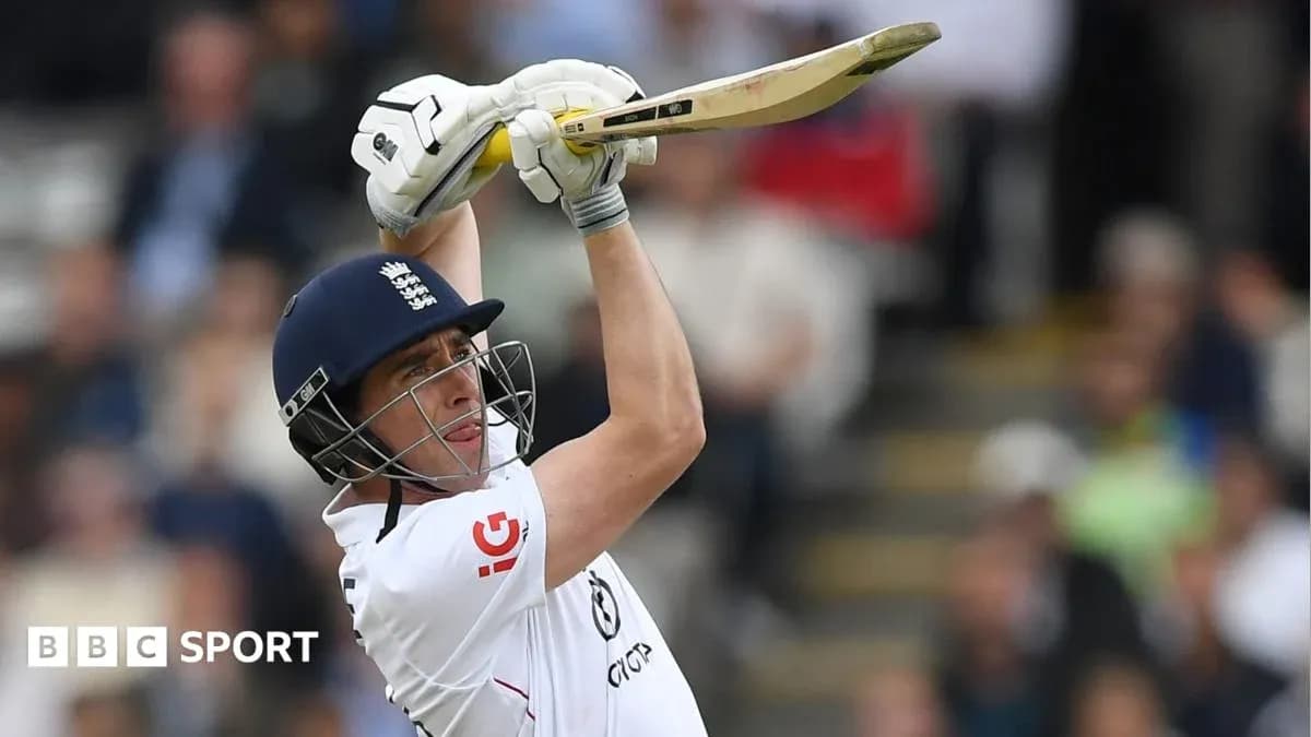 Cricketer batting with raised bat during match Cricketer batting with raised bat during match