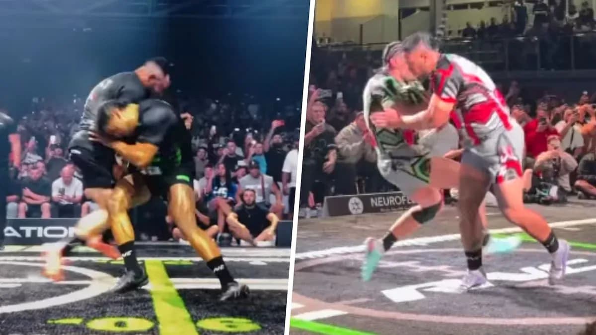 Two athletes competing in a wrestling match Two athletes competing in a wrestling match