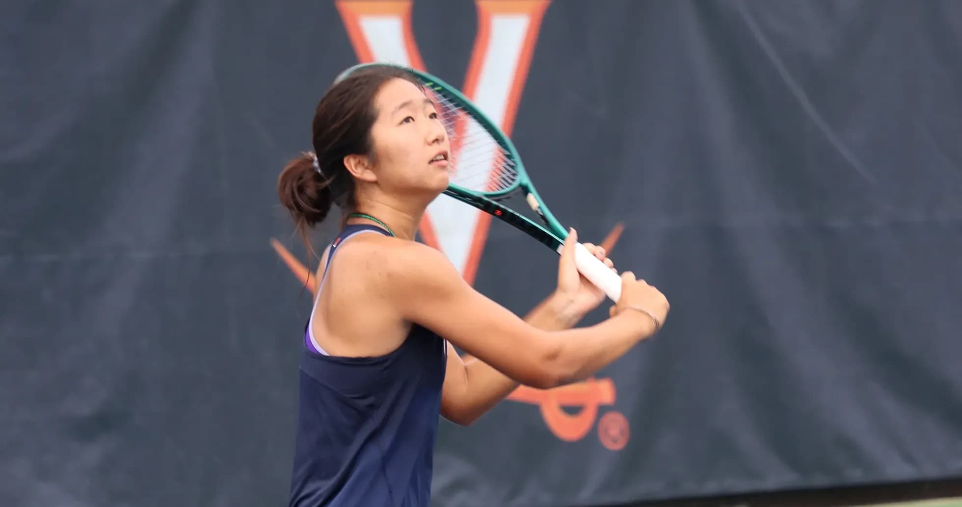Tennis player preparing to hit a ball Tennis player preparing to hit a ball