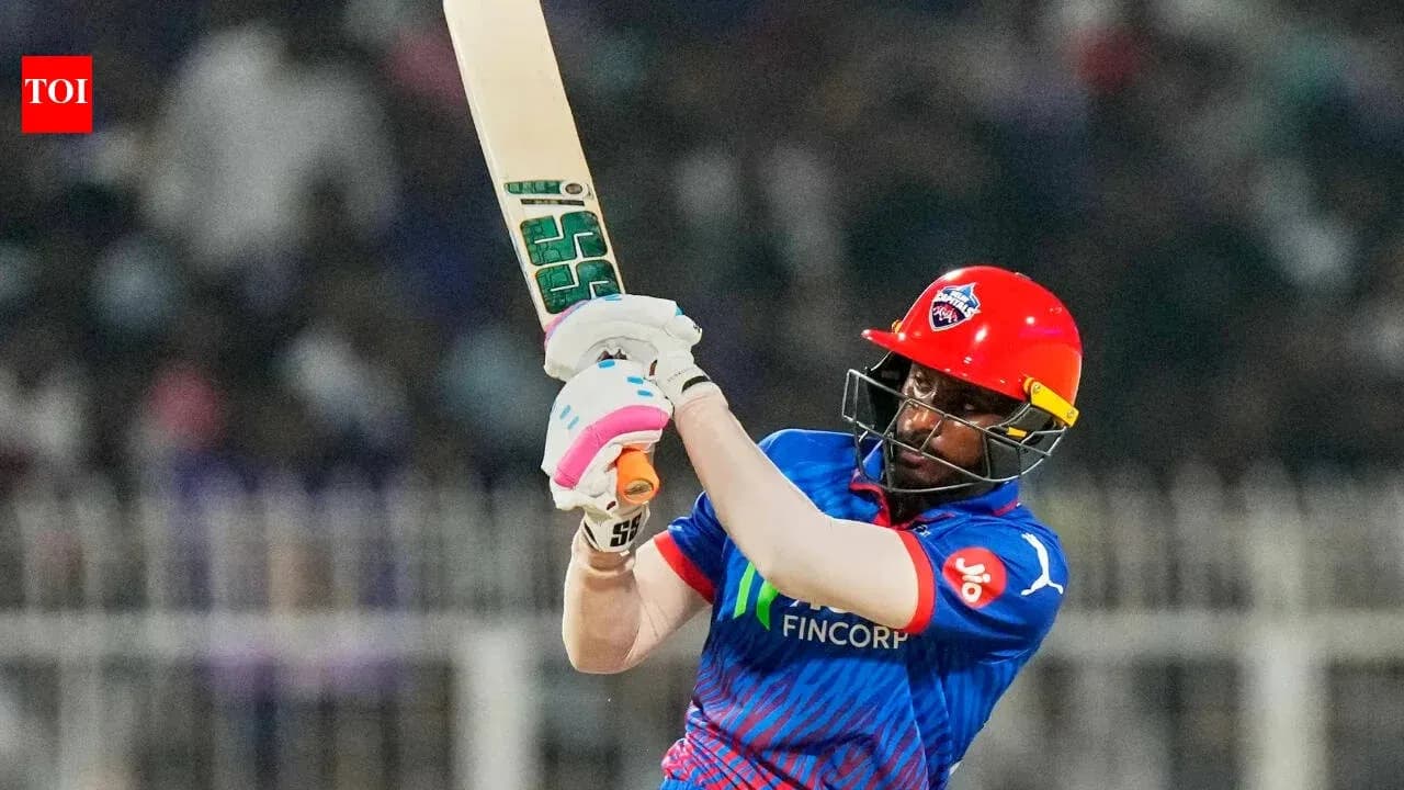 Batter playing a shot during a cricket match Batter playing a shot during a cricket match