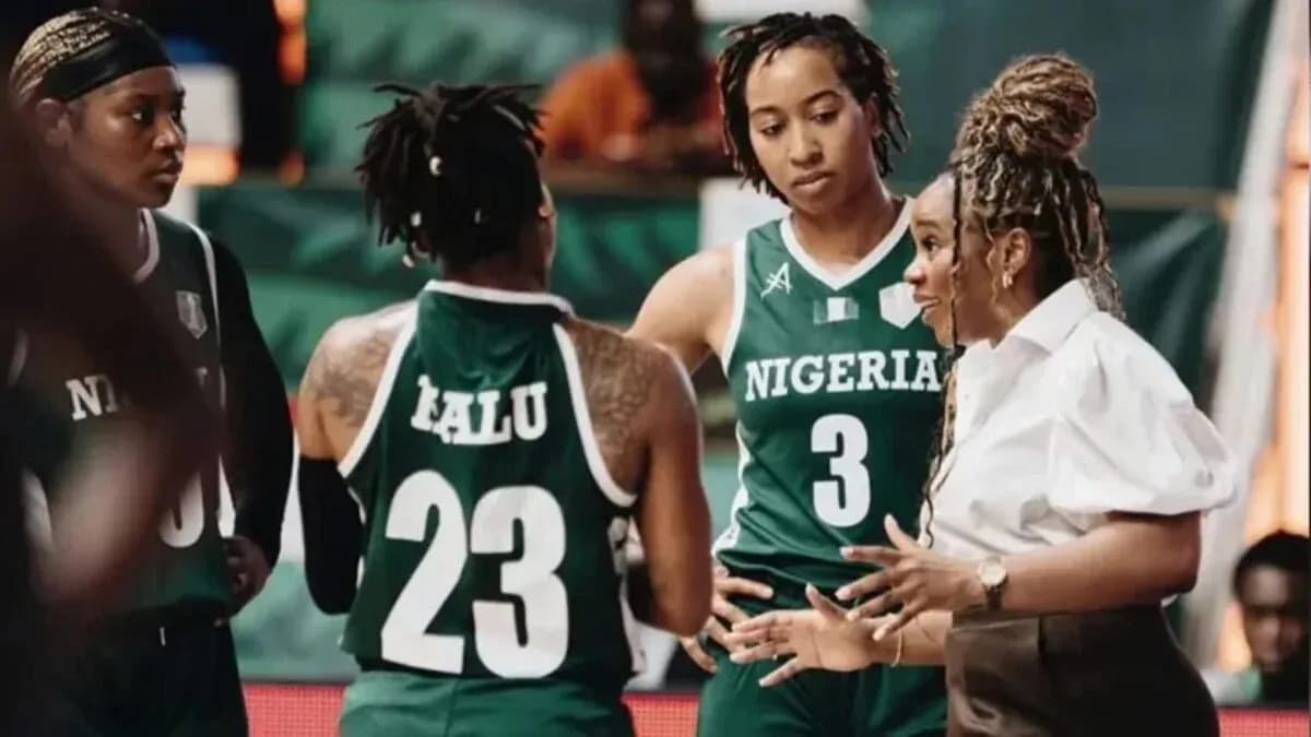 Coach discussing strategy with Nigerian basketball players Coach discussing strategy with Nigerian basketball players