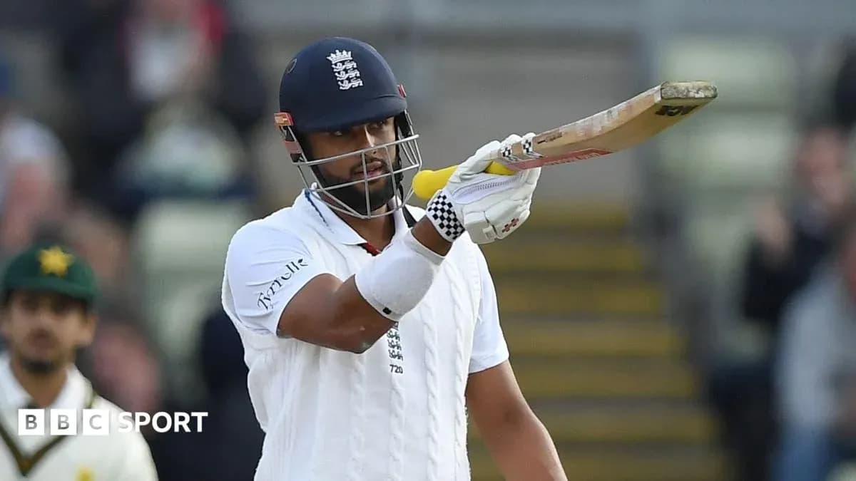 Batsman gesturing with bat during cricket match Batsman gesturing with bat during cricket match