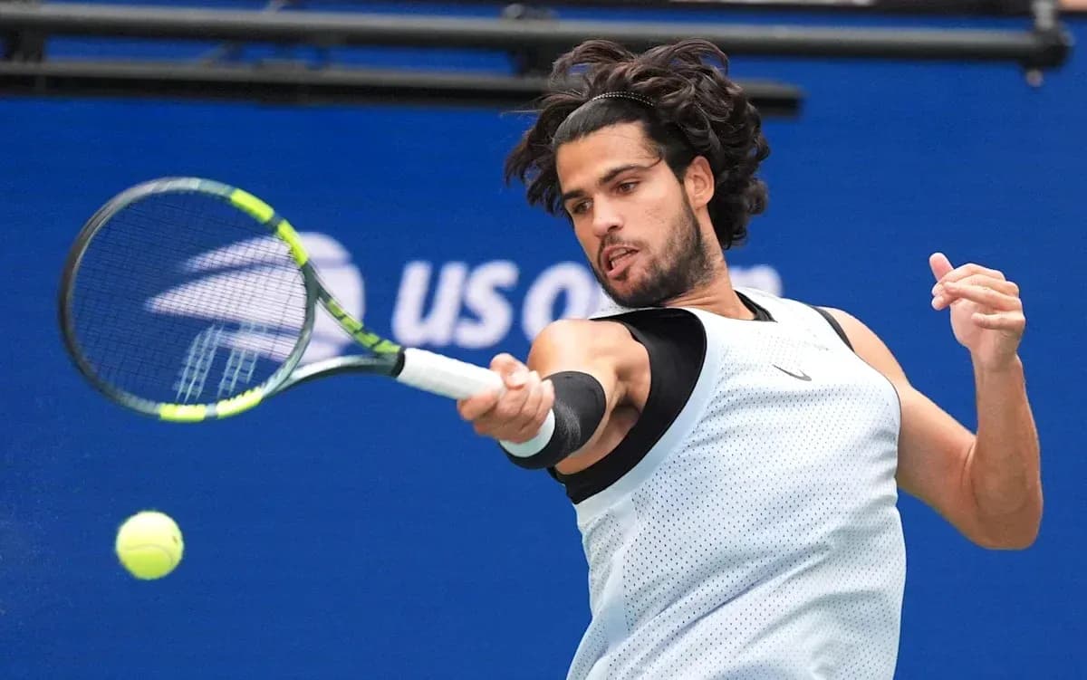 Player hitting a forehand shot during tennis match Player hitting a forehand shot during tennis match