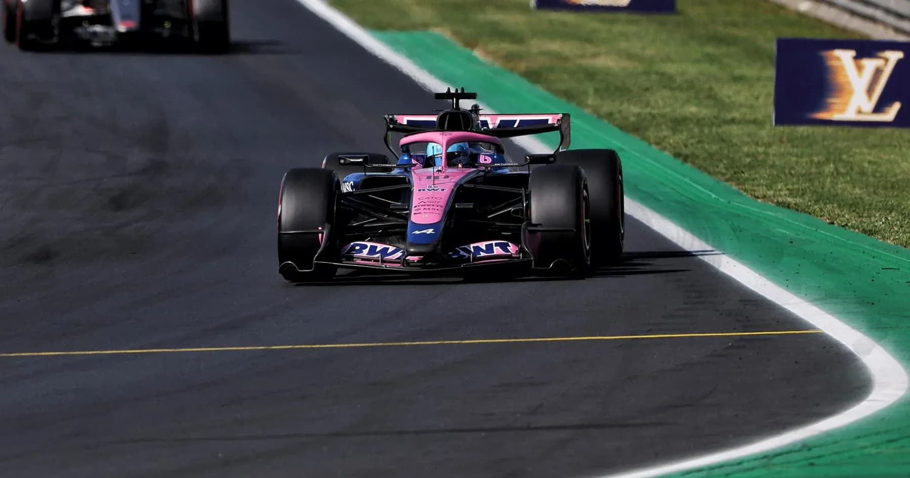 Formula 1 car racing on track during event Formula 1 car racing on track during event