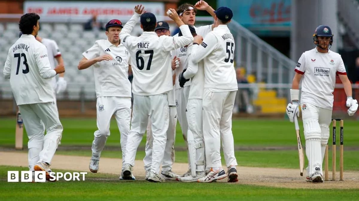Players celebrating after taking a wicket during cricket match Players celebrating after taking a wicket during cricket match