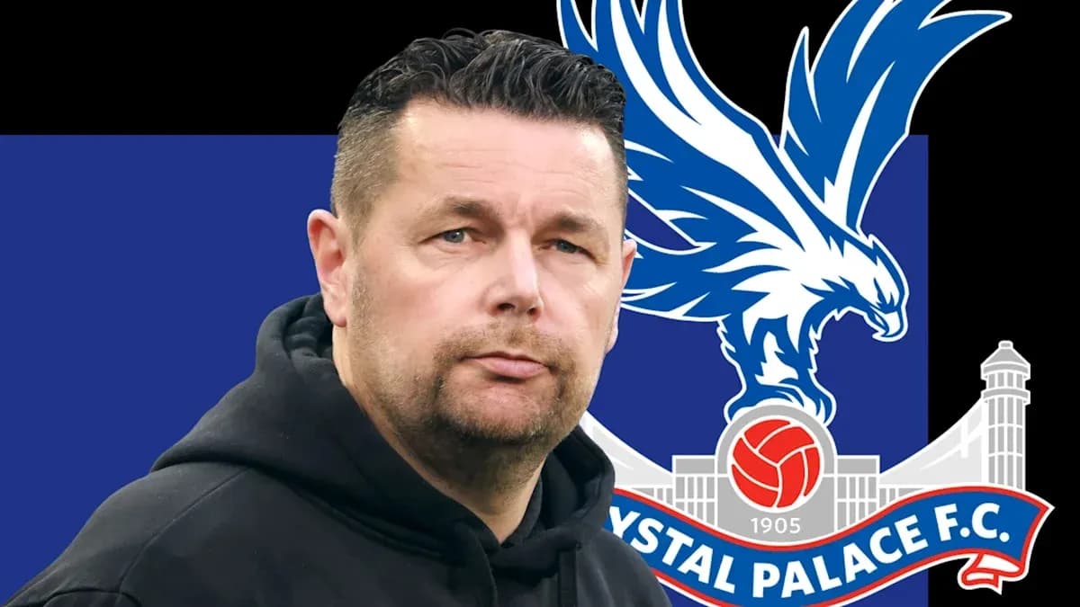 Coach with Crystal Palace FC logo in background Coach with Crystal Palace FC logo in background
