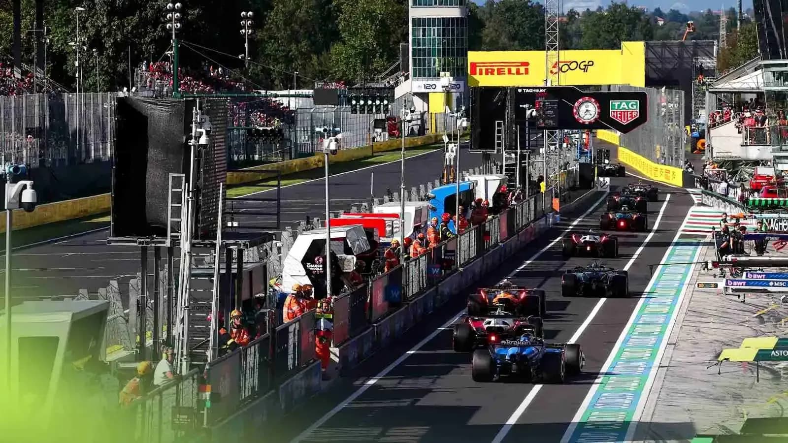Formula 1 cars in the pit lane during race Formula 1 cars in the pit lane during race