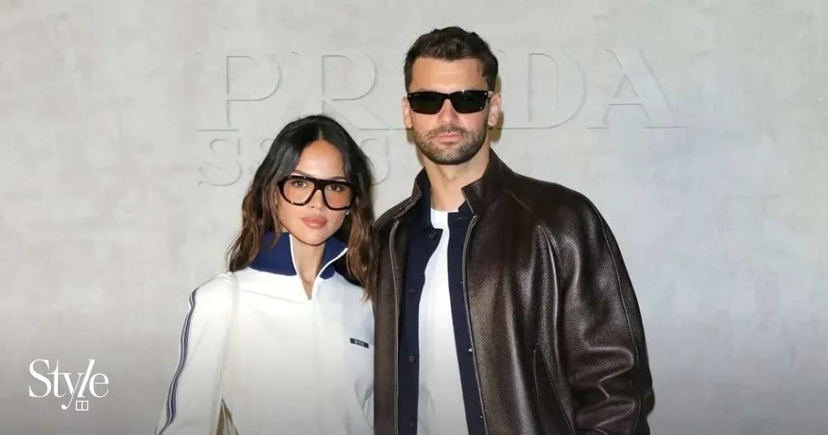 Couple posing at Prada event in stylish outfits Couple posing at Prada event in stylish outfits