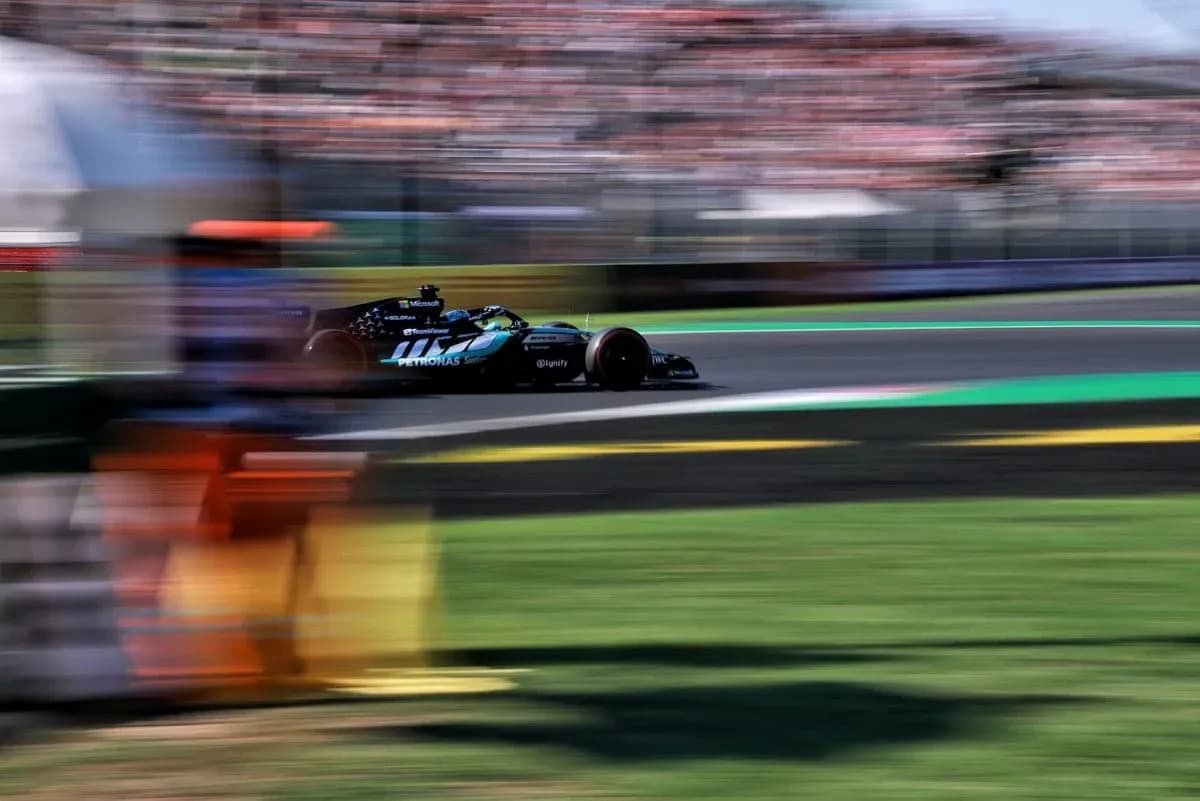 Formula 1 car racing around the track Formula 1 car racing around the track