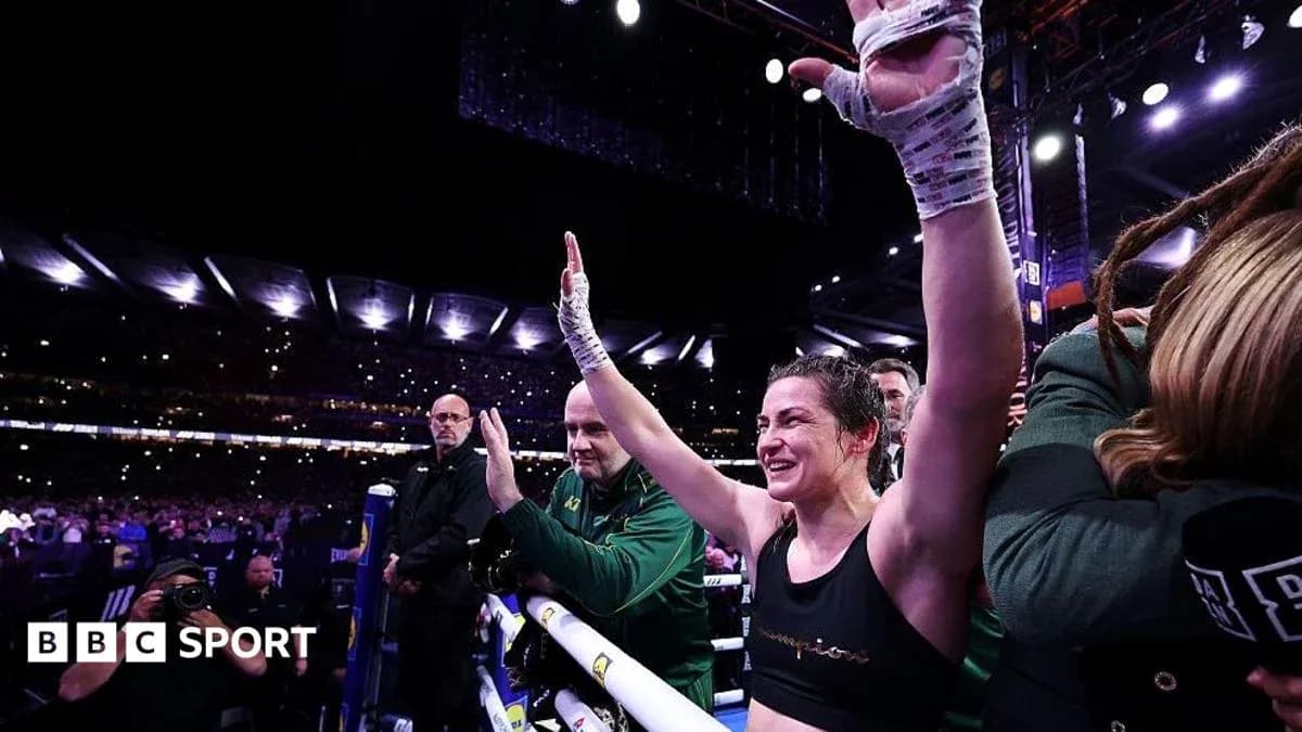 Female boxer celebrating with raised hands after match Female boxer celebrating with raised hands after match