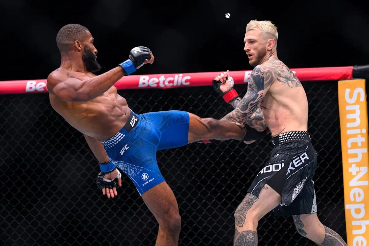 Two fighters engaged in a kick during match Two fighters engaged in a kick during match