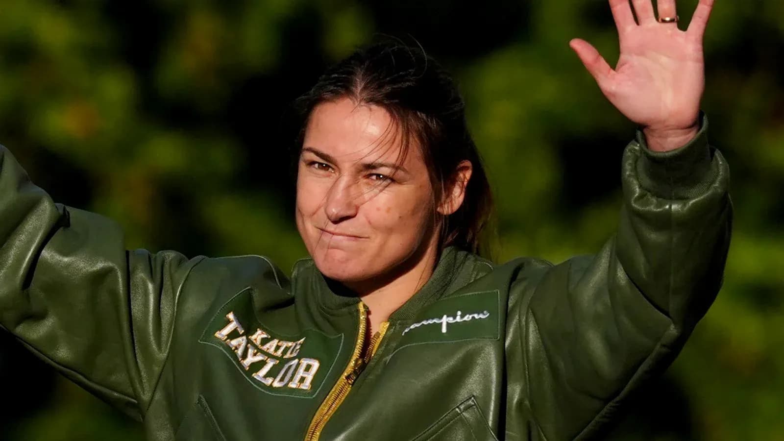 Katie Taylor waving during public appearance outdoors Katie Taylor waving during public appearance outdoors