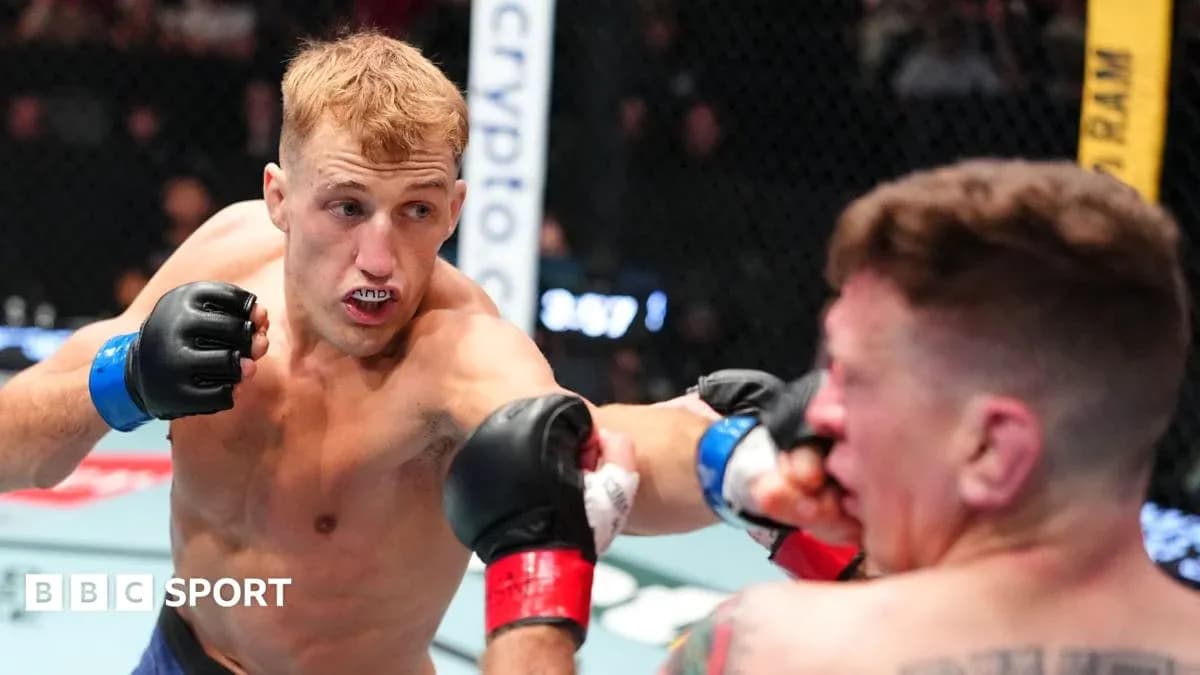 Fighter delivering a punch during MMA match Fighter delivering a punch during MMA match