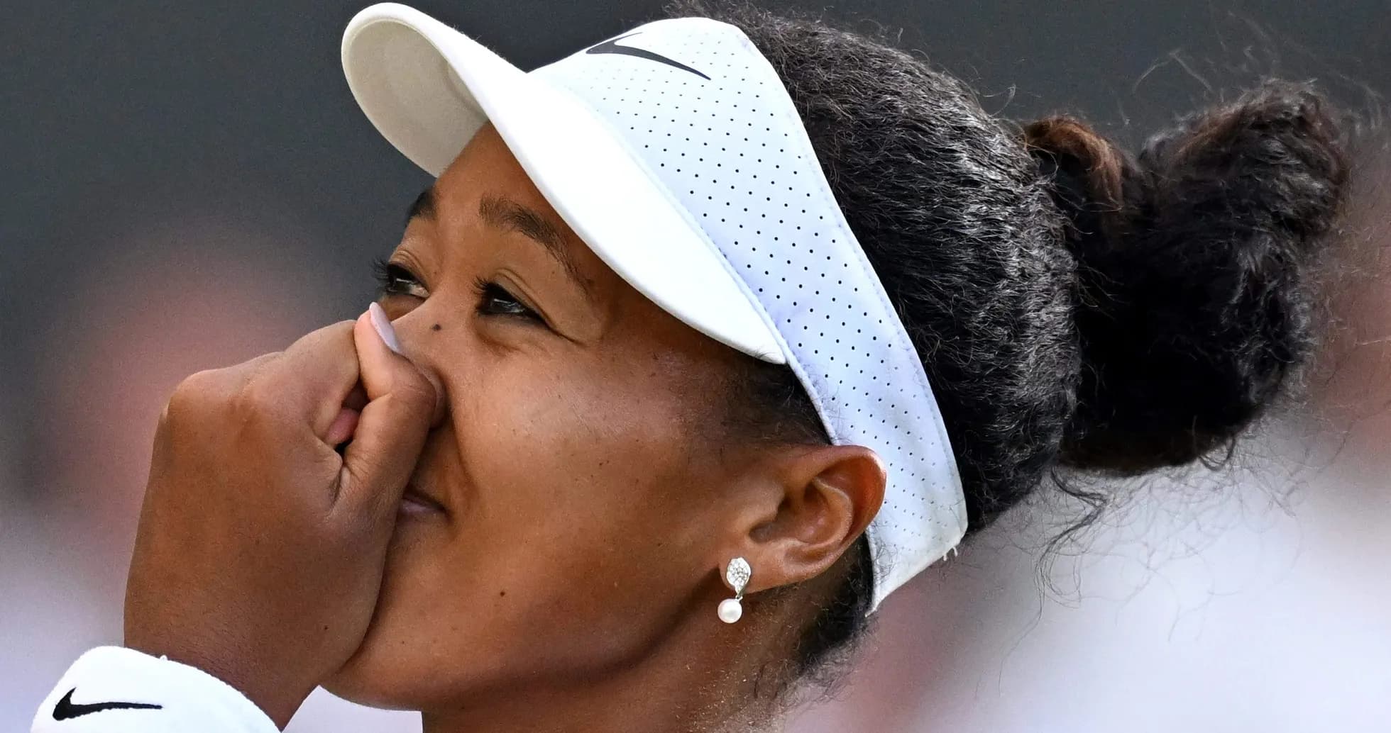 Naomi Osaka celebrating after a match victory Naomi Osaka celebrating after a match victory