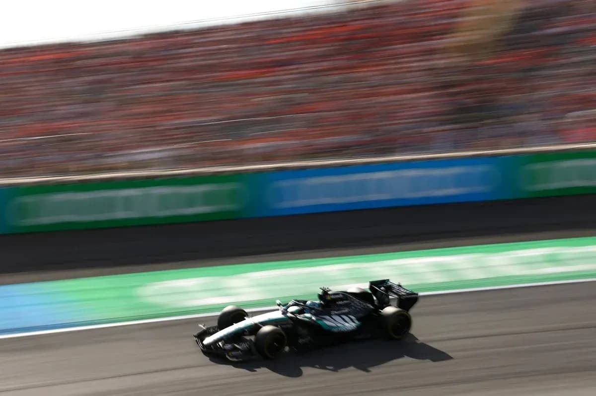 Formula 1 car racing on track during event Formula 1 car racing on track during event