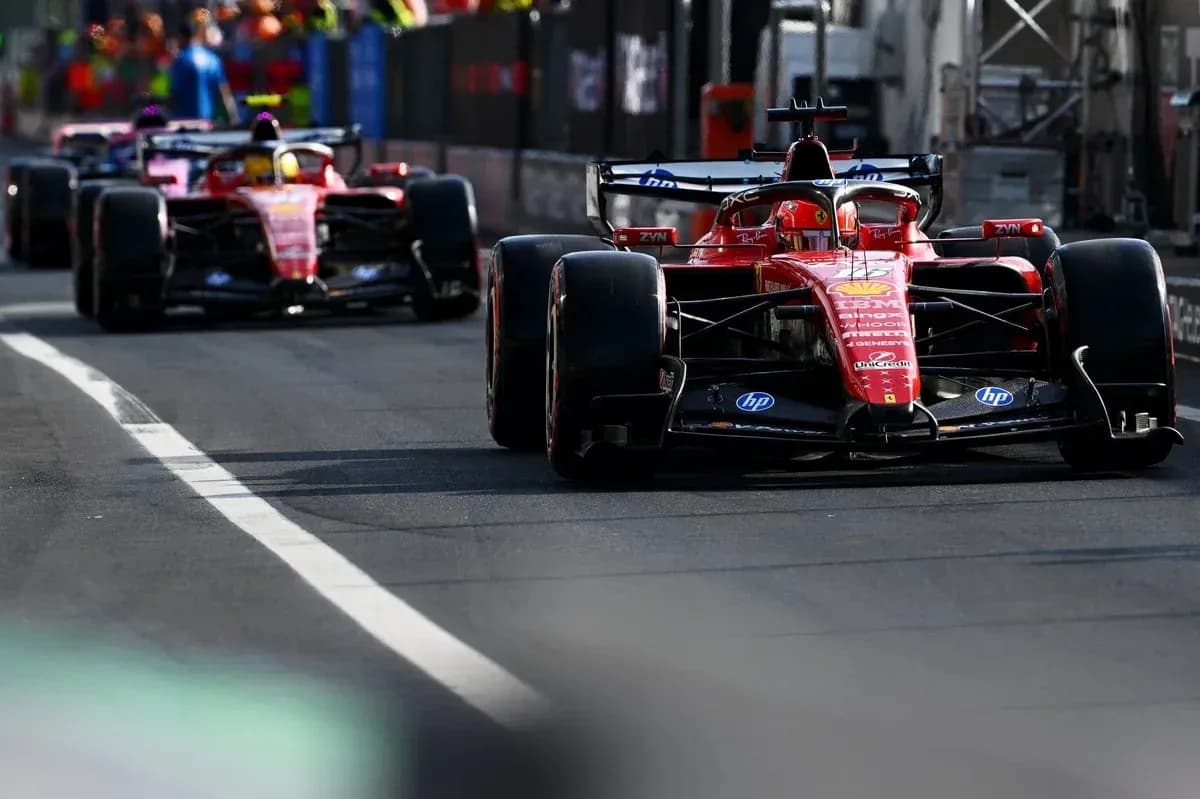 Ferrari cars on pit lane during Formula 1 event Ferrari cars on pit lane during Formula 1 event