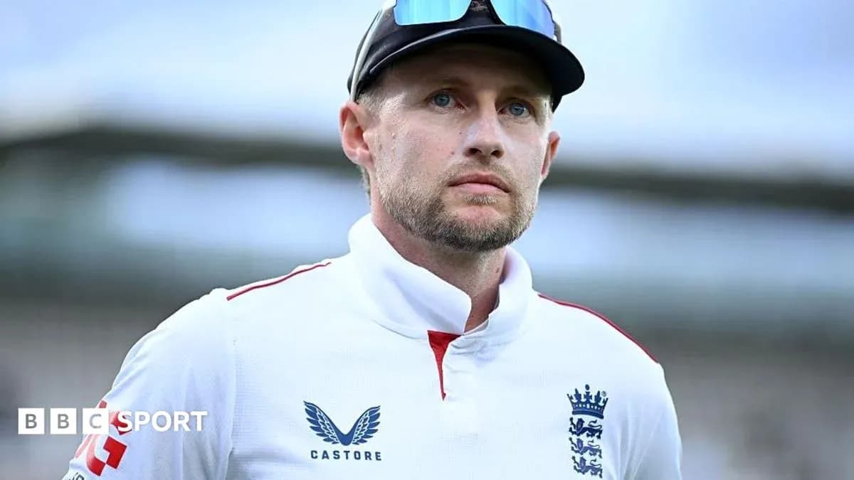 Cricketer wearing England team uniform at venue Cricketer wearing England team uniform at venue