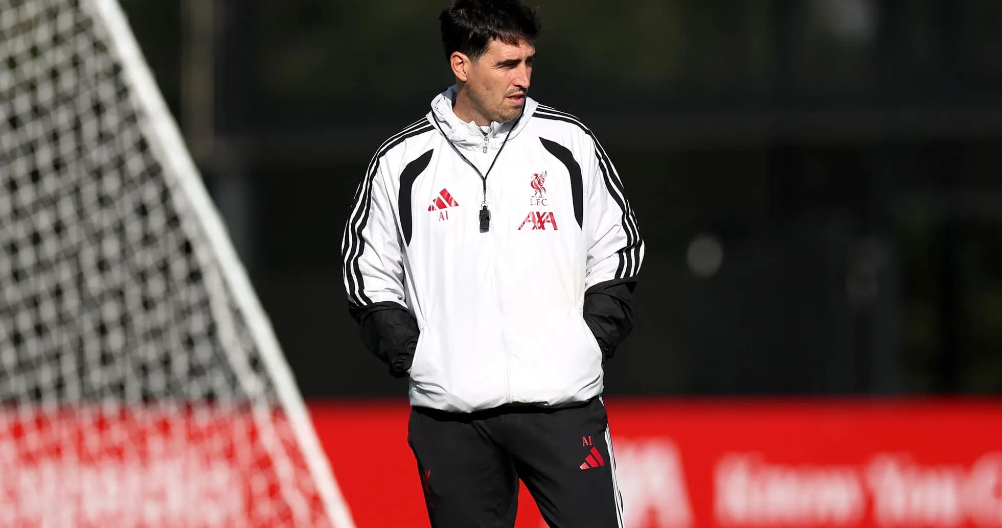 Coach observing players during training session Coach observing players during training session