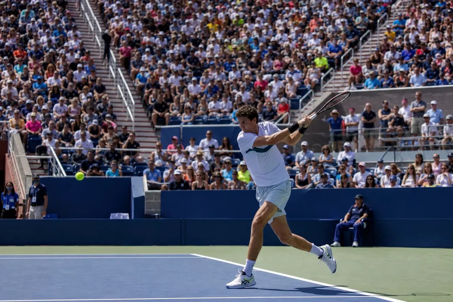 Player hitting a forehand shot during match Player hitting a forehand shot during match