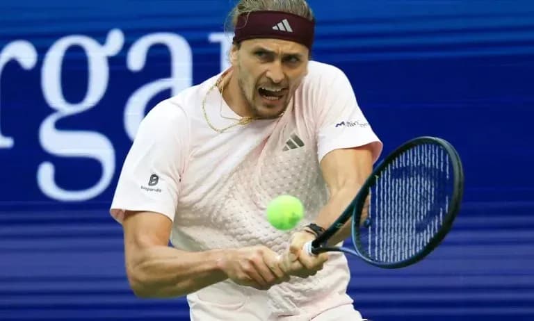 Player hitting a tennis ball during a match Player hitting a tennis ball during a match