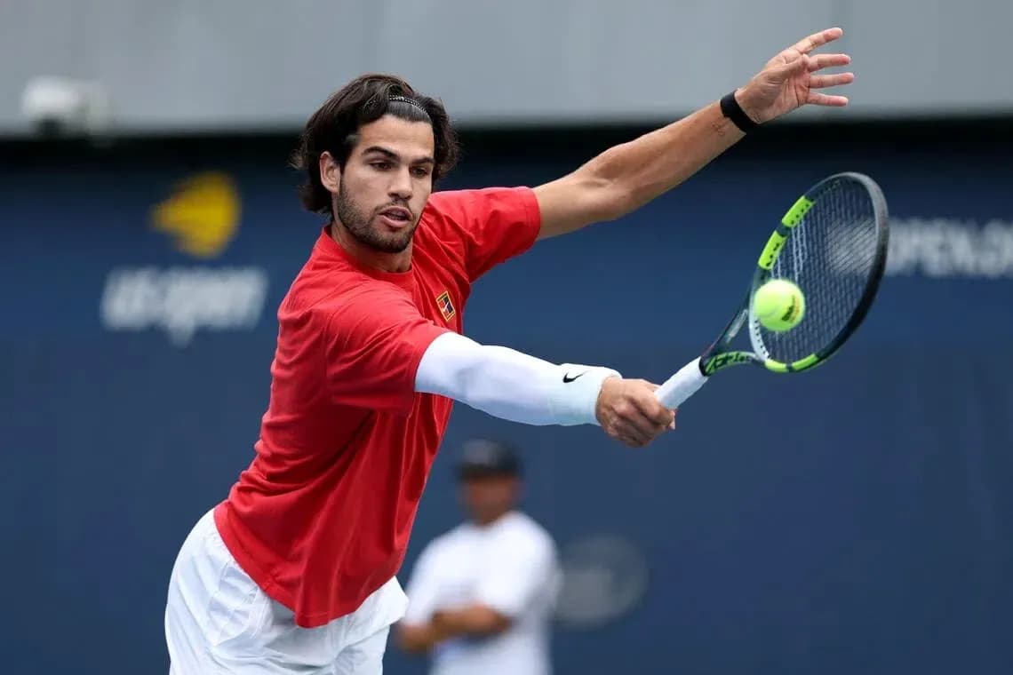Player hitting a forehand during practice session Player hitting a forehand during practice session