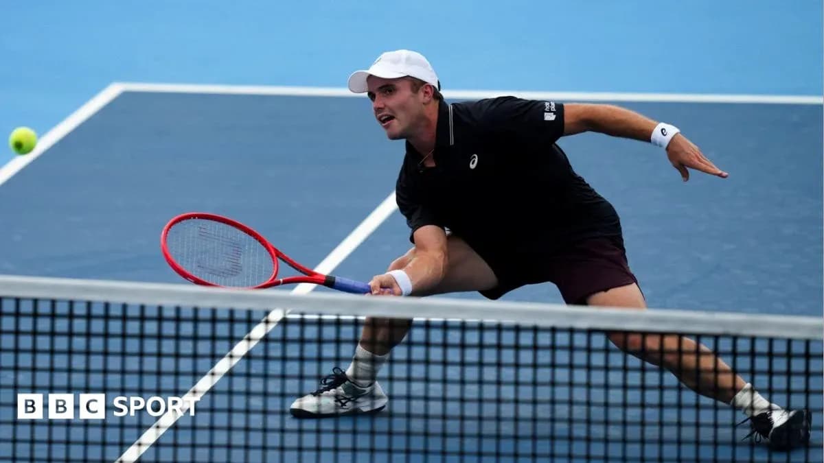 Player reaching for a tennis ball during match Player reaching for a tennis ball during match