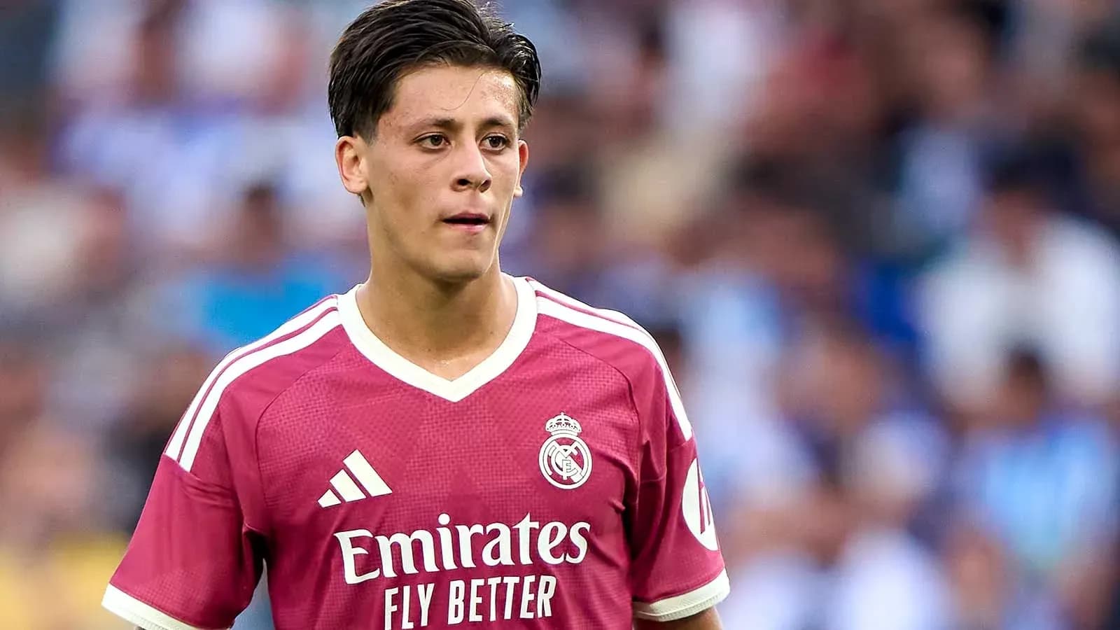 Young player in Real Madrid jersey during match Young player in Real Madrid jersey during match