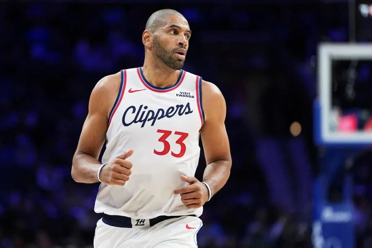 Player in Clippers jersey during basketball game Player in Clippers jersey during basketball game