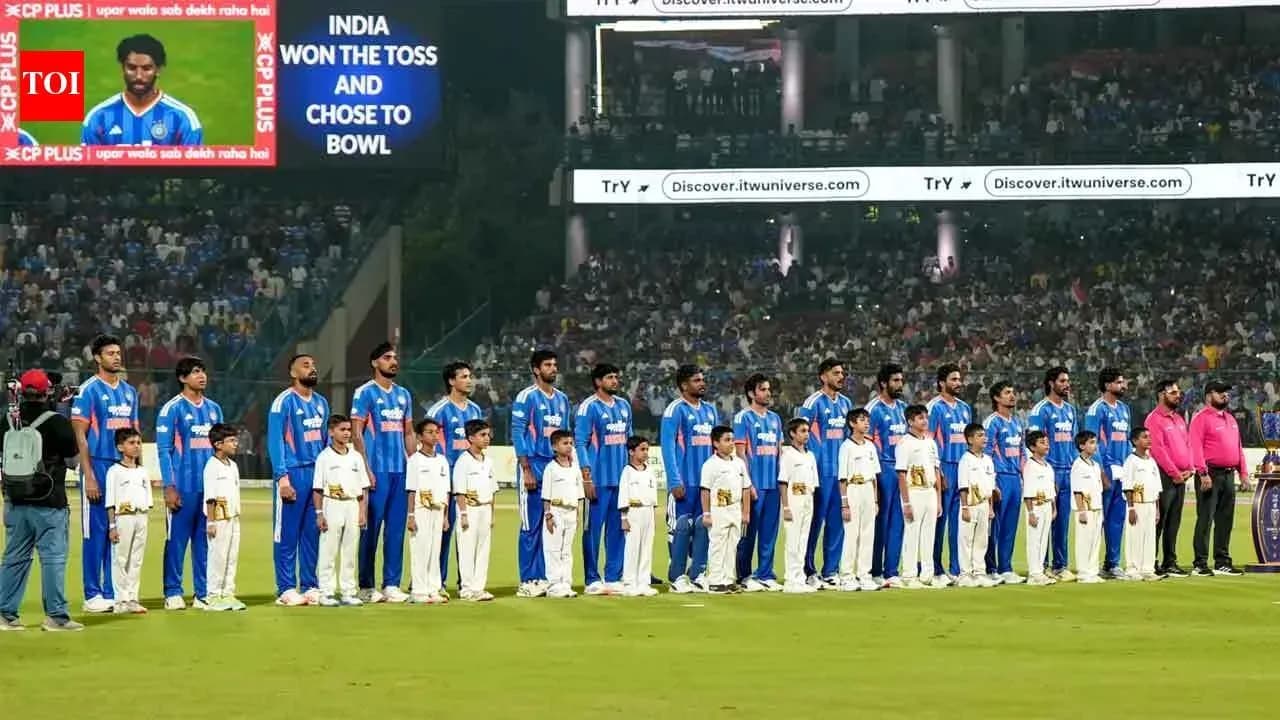 Cricket team and children standing before the match Cricket team and children standing before the match