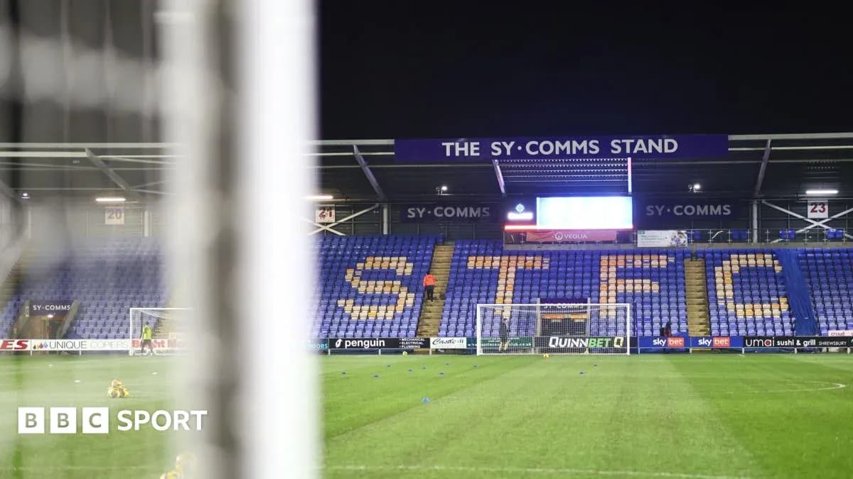 Shrewsbury Town stadium with empty seats and goal Shrewsbury Town stadium with empty seats and goal