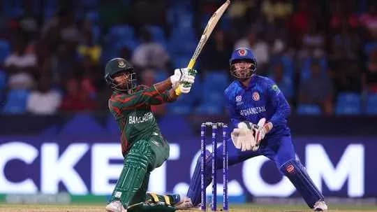 Batsman playing a shot against the bowler Batsman playing a shot against the bowler