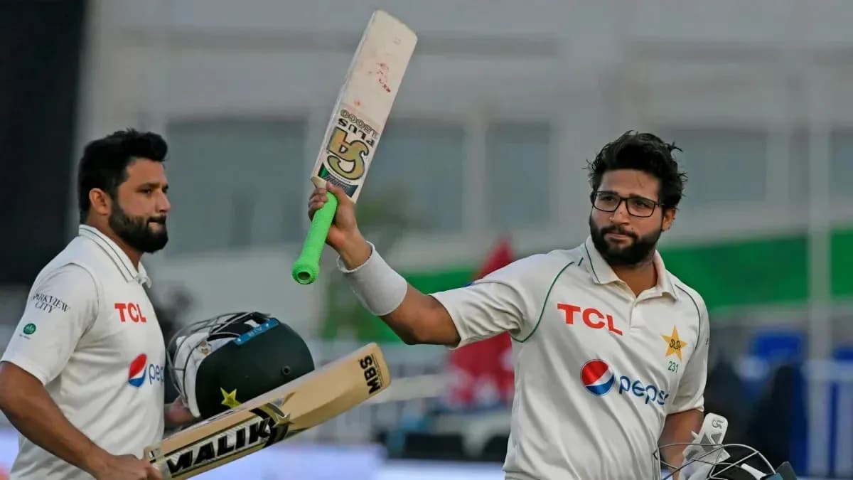 Two cricket players celebrating after a match Two cricket players celebrating after a match