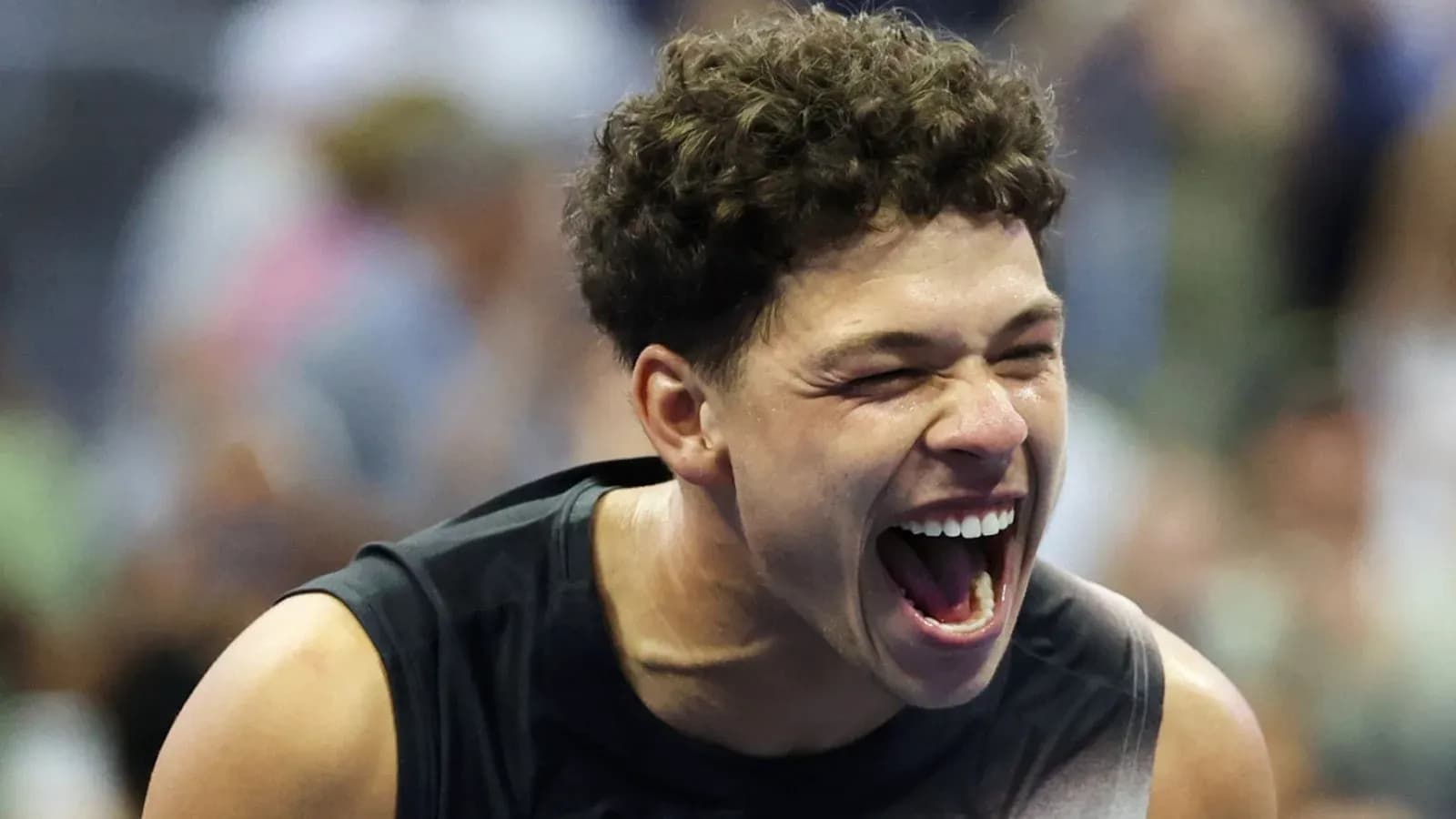 Player celebrating during a tennis match Player celebrating during a tennis match