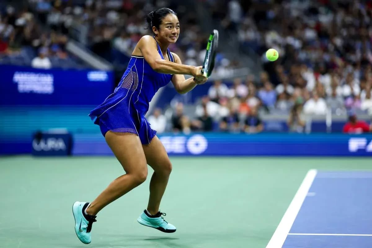 Player hitting a tennis ball during match Player hitting a tennis ball during match