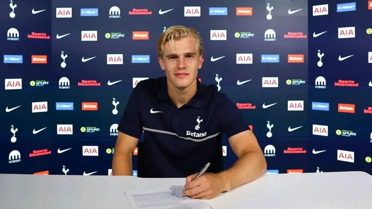 Player signing contract at Tottenham Hotspur press conference Player signing contract at Tottenham Hotspur press conference