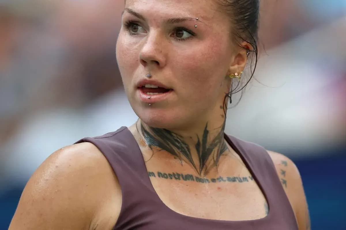 Athlete with tattoos during a match close-up Athlete with tattoos during a match close-up