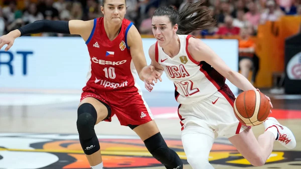 Player from USA dribbling past opponent during game Player from USA dribbling past opponent during game