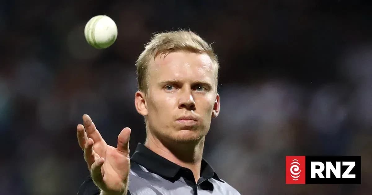 Umpire throwing a cricket ball during match Umpire throwing a cricket ball during match