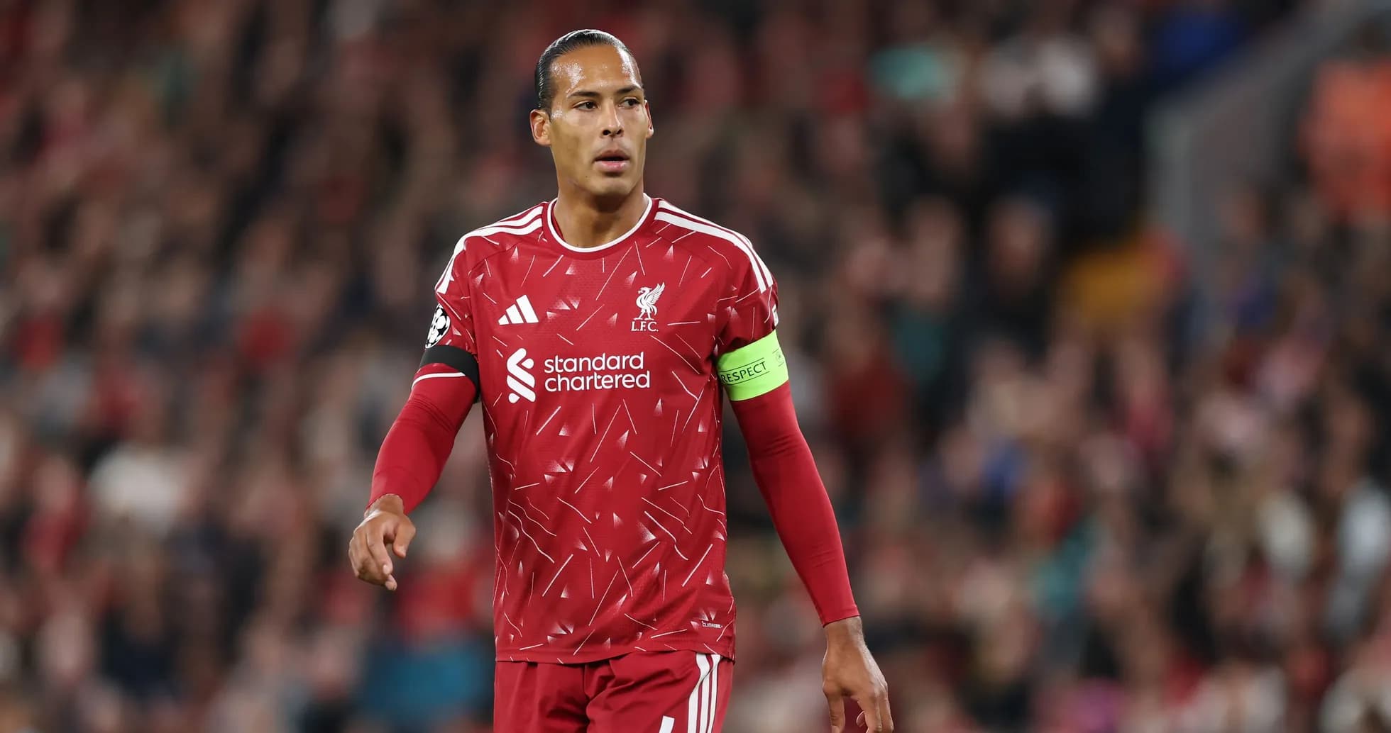 Liverpool player wearing captain's armband during match Liverpool player wearing captain's armband during match