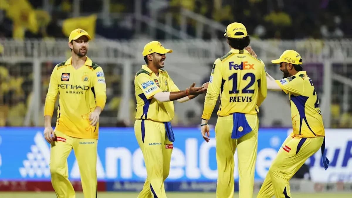 Chennai Super Kings players celebrating a wicket Chennai Super Kings players celebrating a wicket