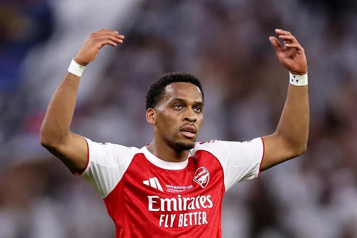 Player gesturing during match wearing Arsenal jersey Player gesturing during match wearing Arsenal jersey