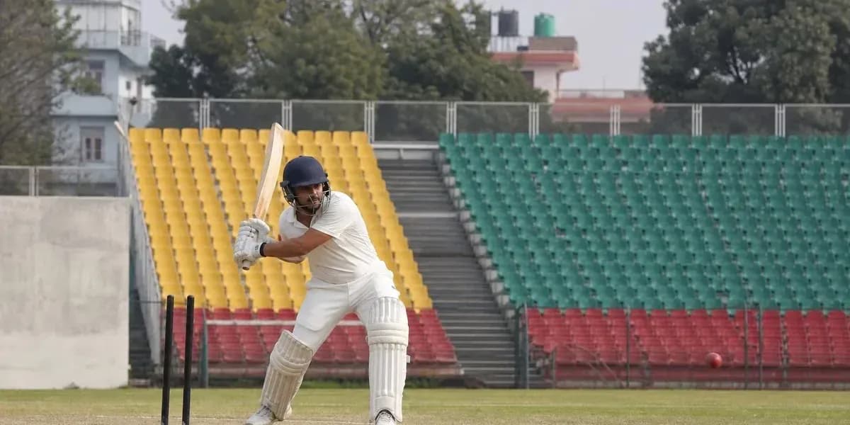 Batsman preparing to hit the ball in cricket match Batsman preparing to hit the ball in cricket match